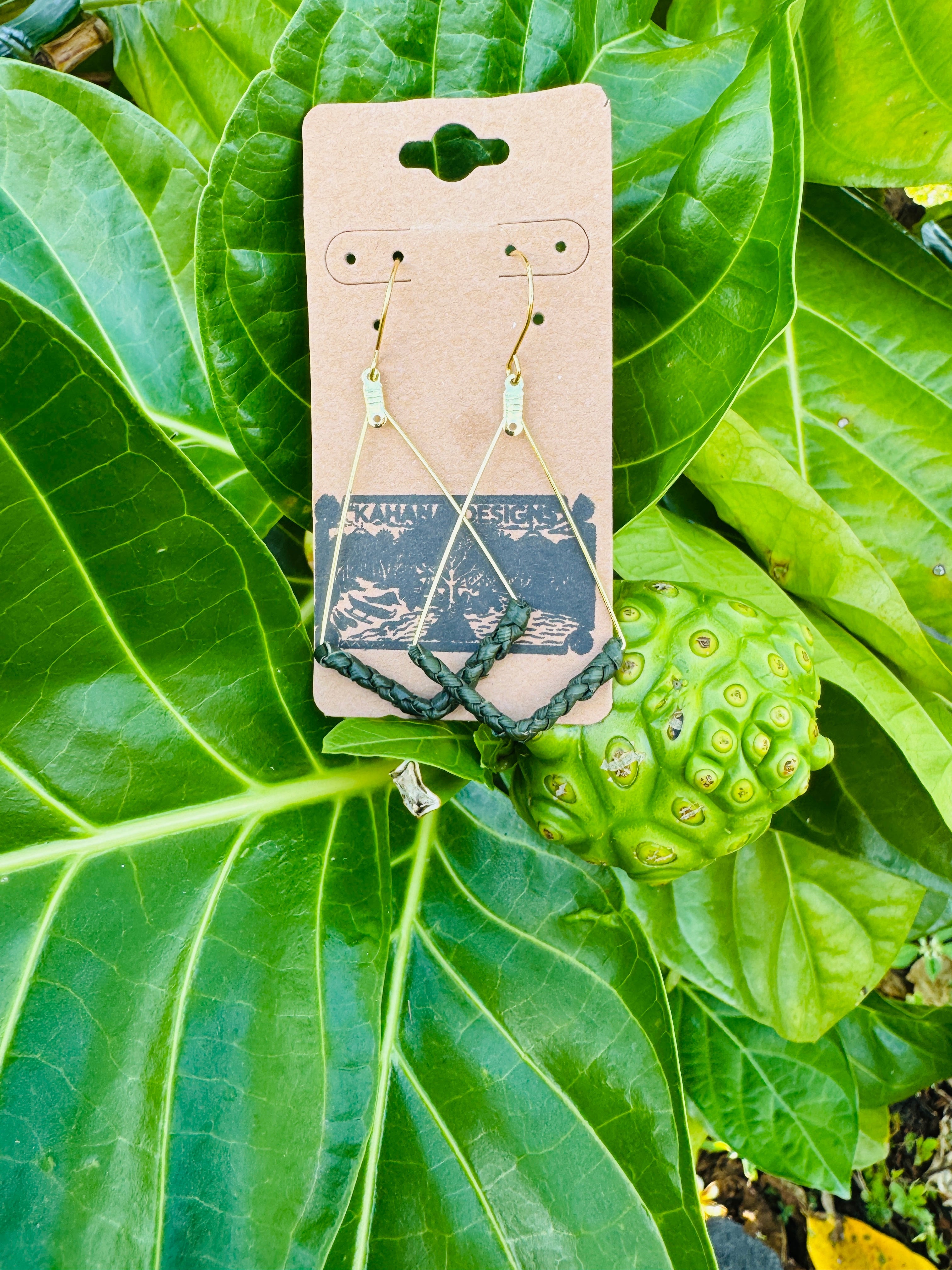 Handwoven Hawaiian lauhala earrings wrapped in gold, made by Kahana Designs in Kailua-Kona, Hawaiʻi