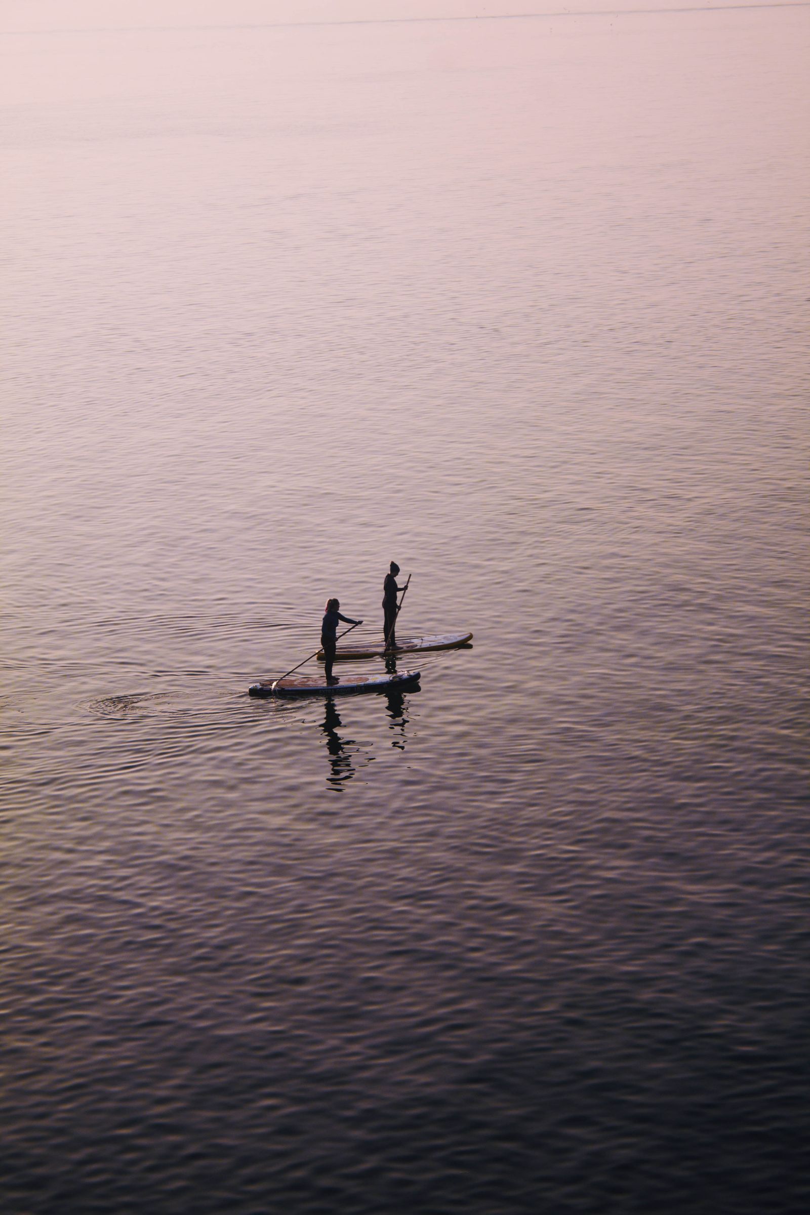 Paddlers in an outrigger canoe on the ocean, Hawaiʻi