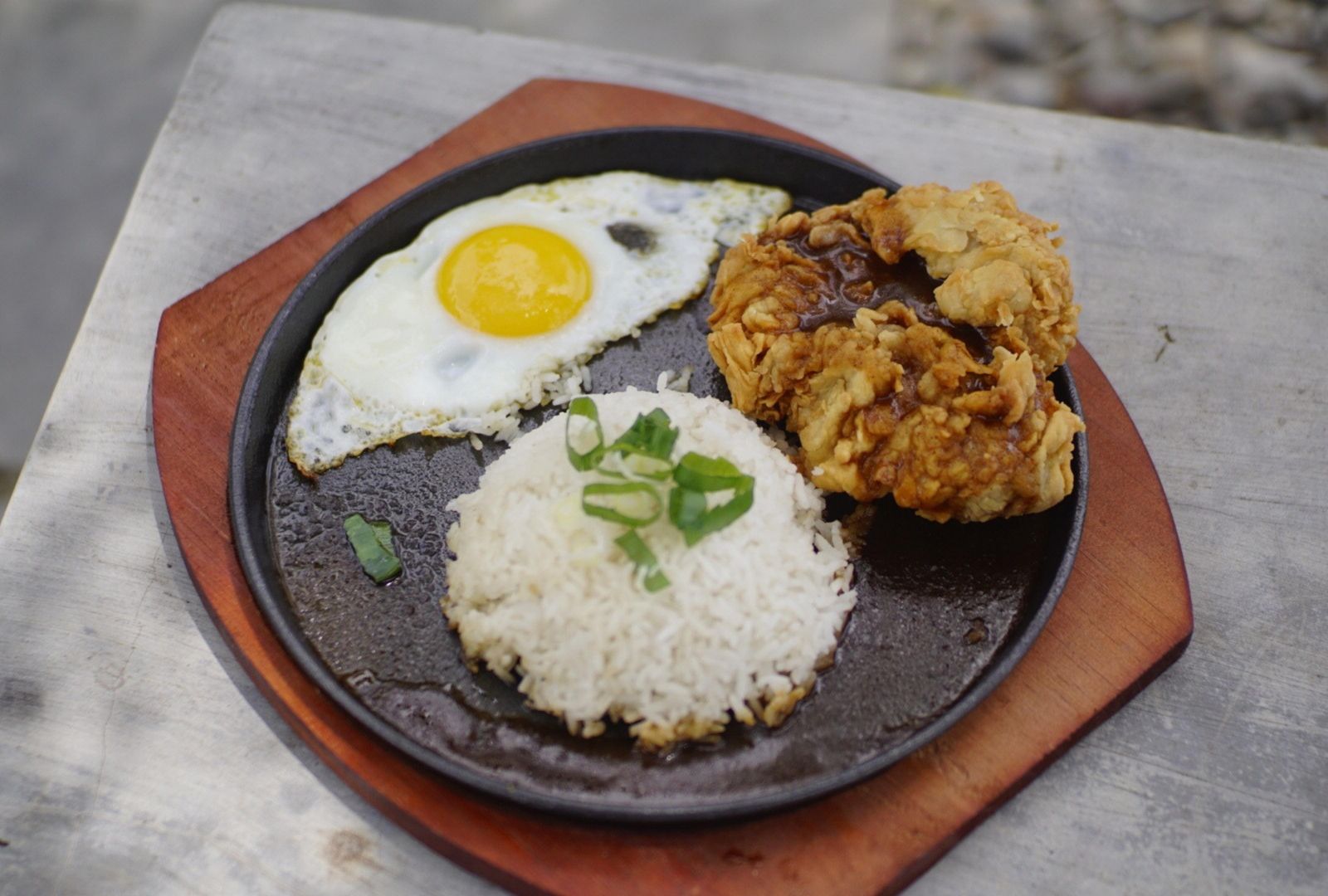 Hawaiian plate lunch with fried meat, rice, and egg in Hawaiʻi