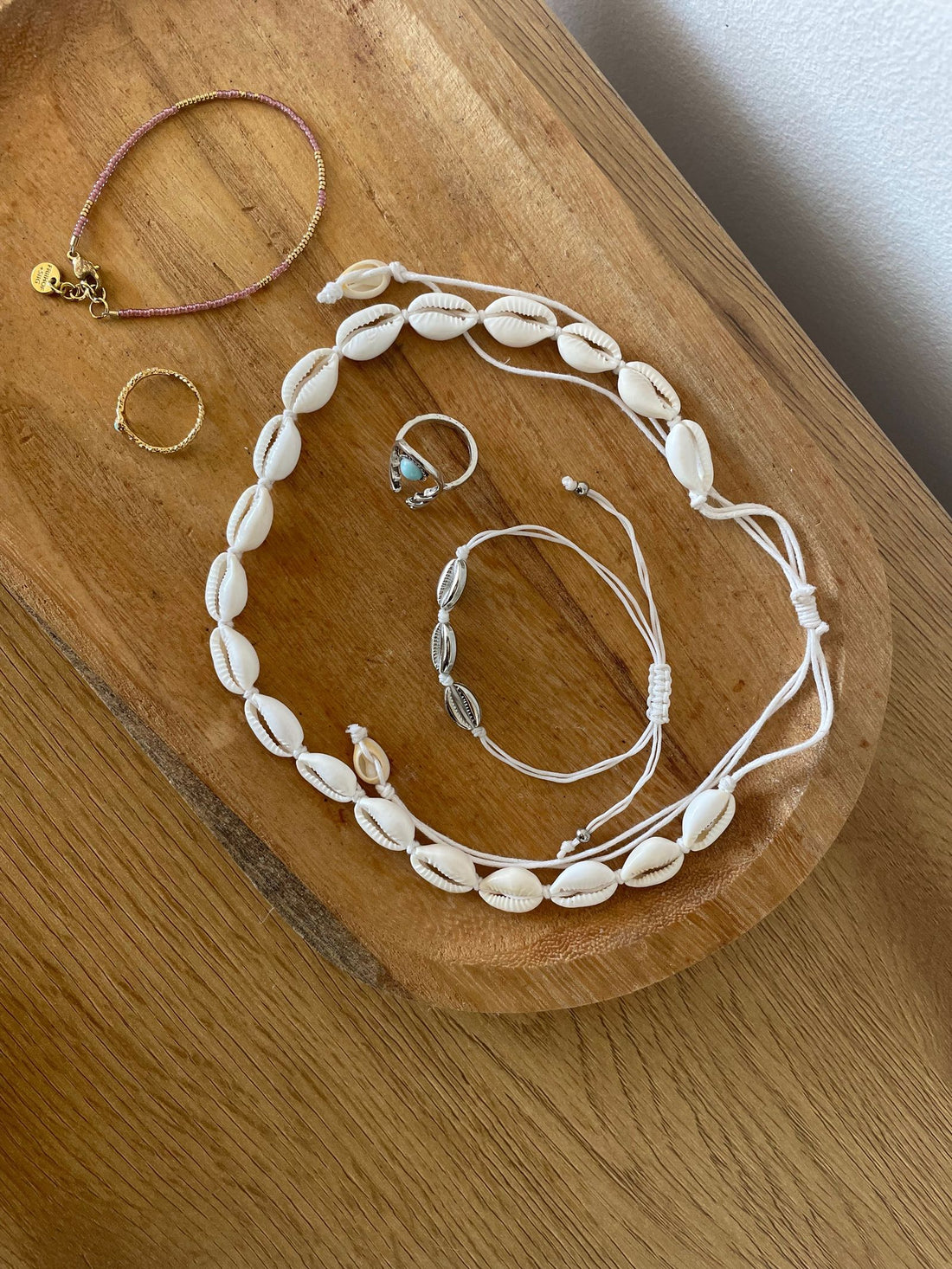 A puka shell necklace, traditional Hawaiian jewelry