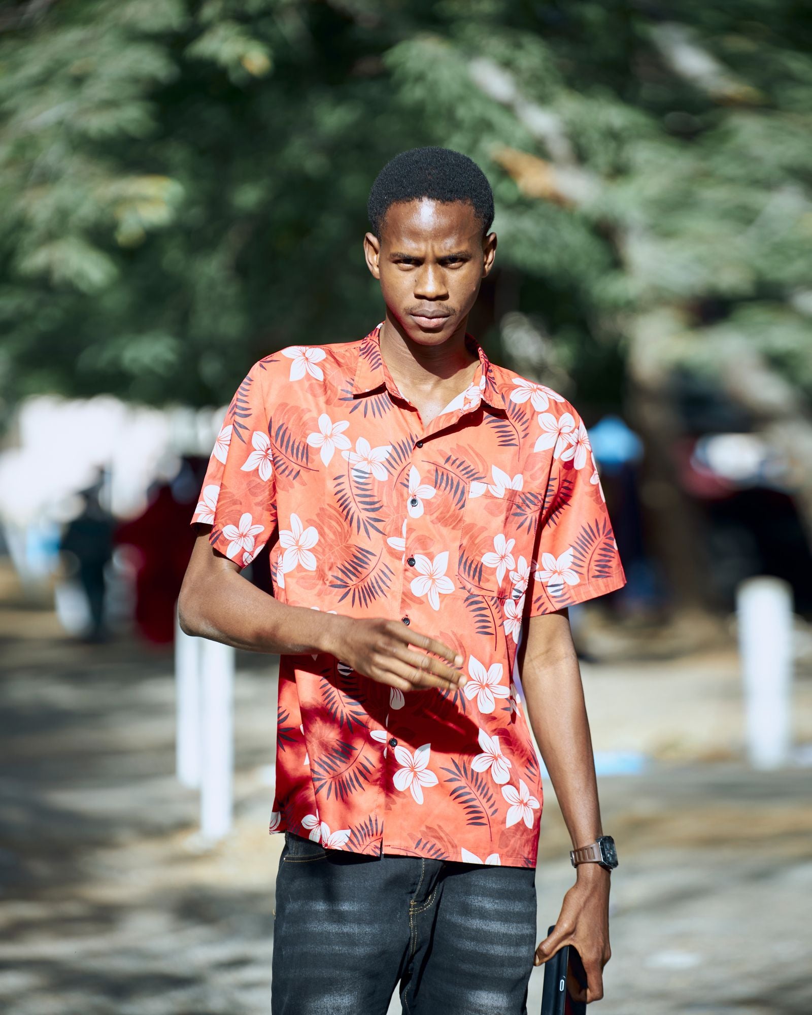 A man wearing a classic Hawaiian aloha shirt