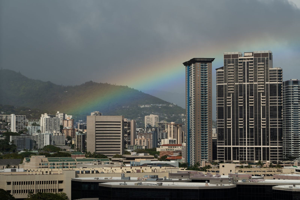 Rainbow arching over Honolulu, Hawaiʻi during a rainy-season storm