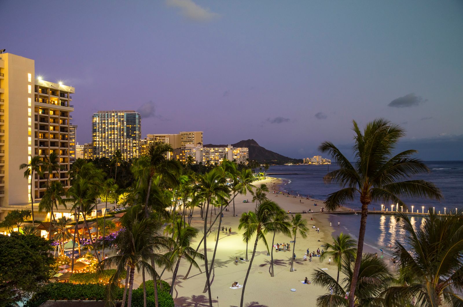 Waikīkī Beach at twilight with Diamond Head in the distance, Oʻahu, Hawaiʻi