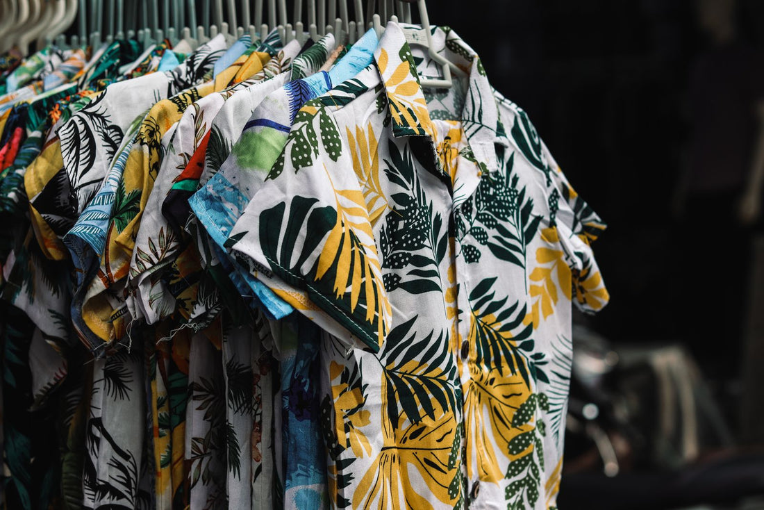 Colorful Hawaiian print shirts hanging on a rack, Hawaiʻi