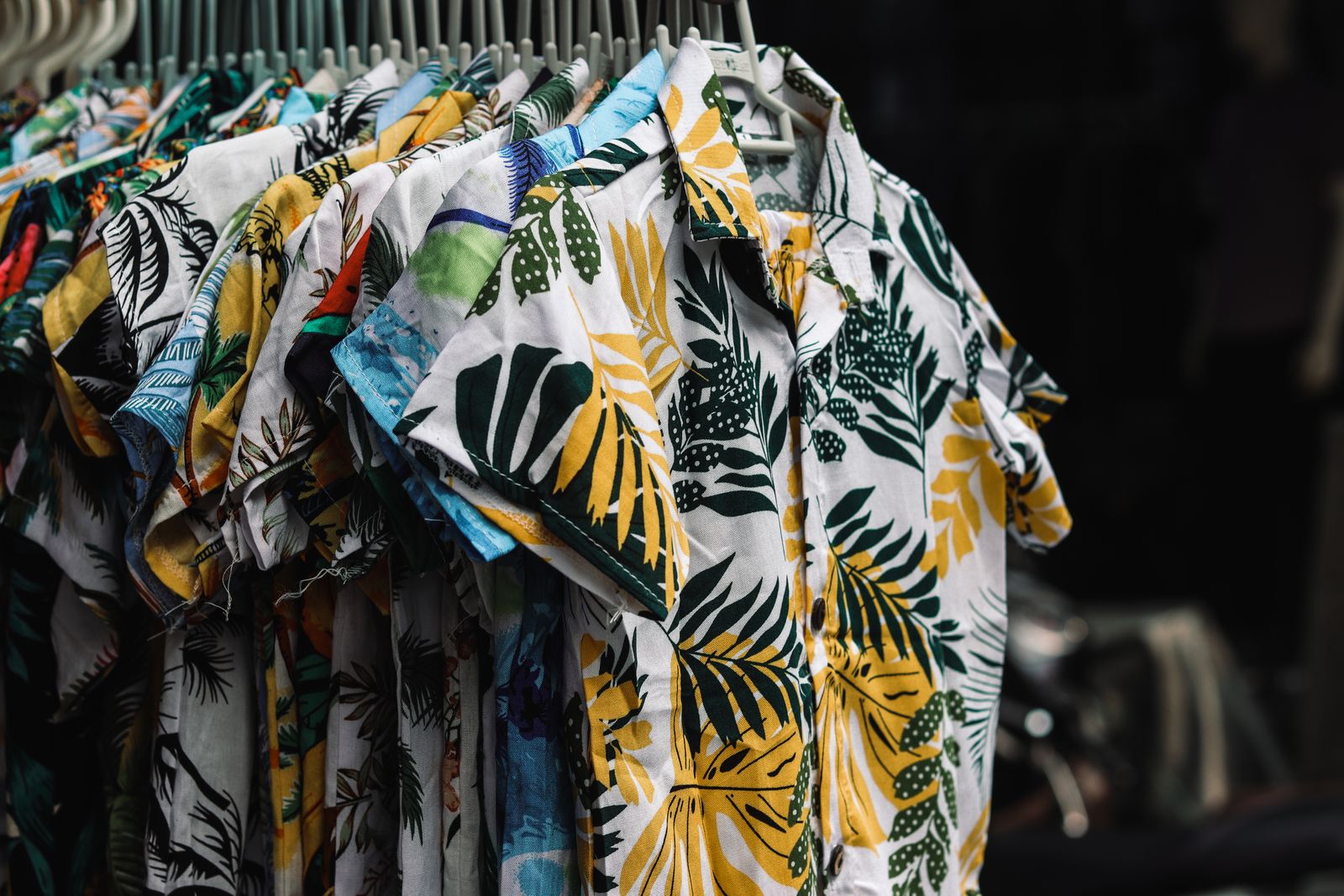 Colorful Hawaiian print shirts hanging on a rack, Hawaiʻi