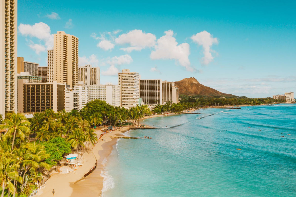 Waikiki Beach and Diamond Head crater in Hawaiʻi, a popular budget travel destination