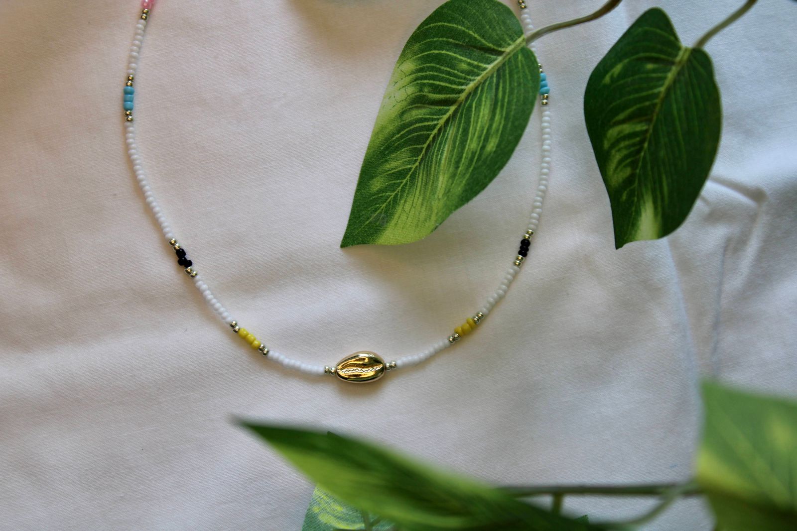A shell and bead necklace, traditional Hawaiian adornment