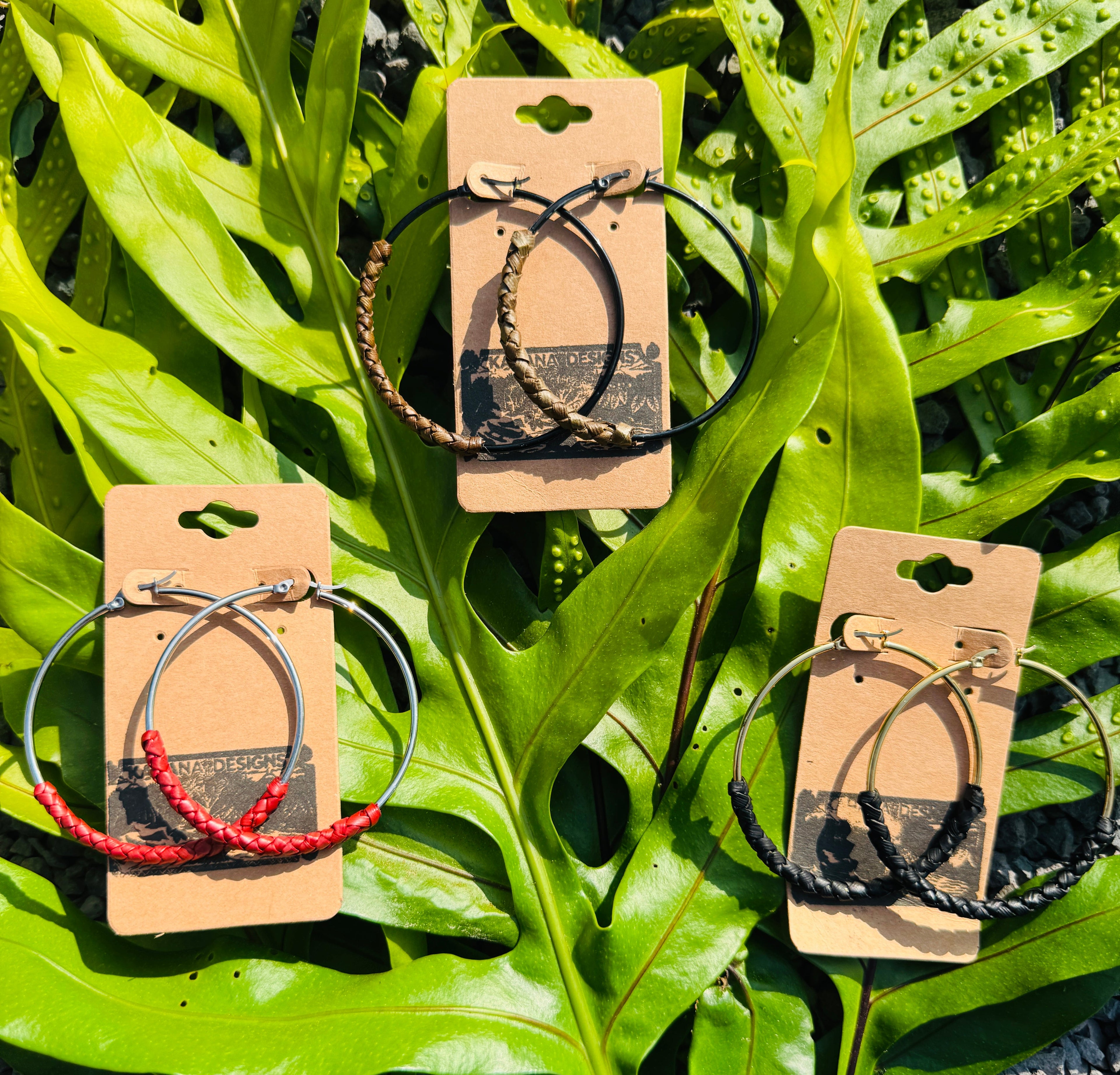 Gold Laka Hoops ʻEleʻele — gold hoop earrings wrapped in black lauhala