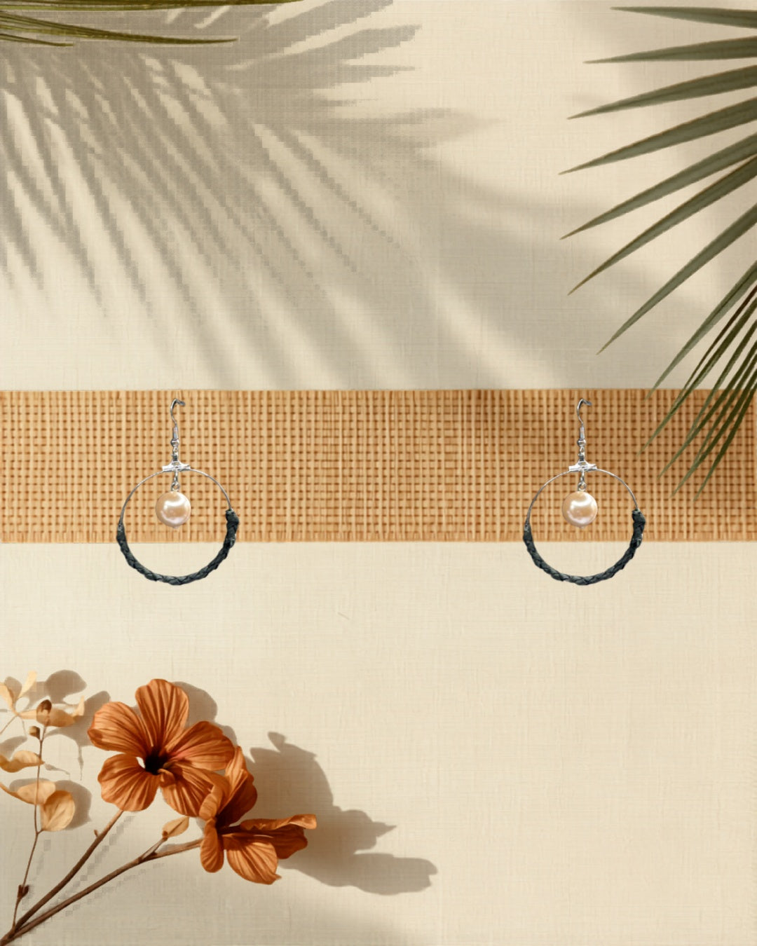 Lauhala half wrap silver hoop earrings Beige Shell Pearl variant styled on tropical Hawaiian background