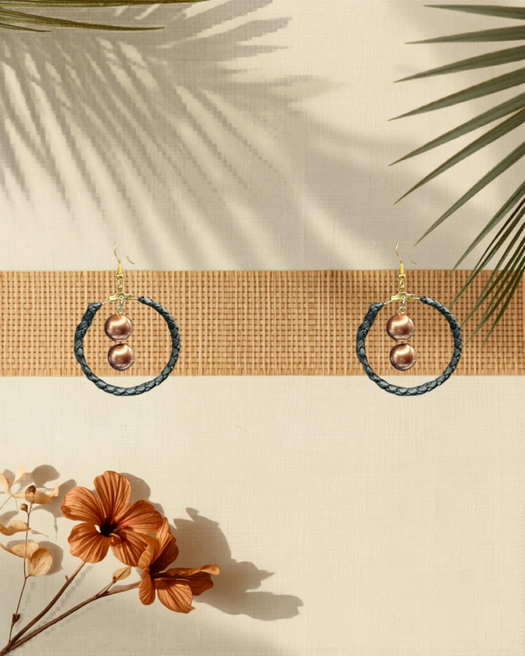 Lauhala double row gold hoop earrings Brown Shell Pearl variant styled on tropical Hawaiian background