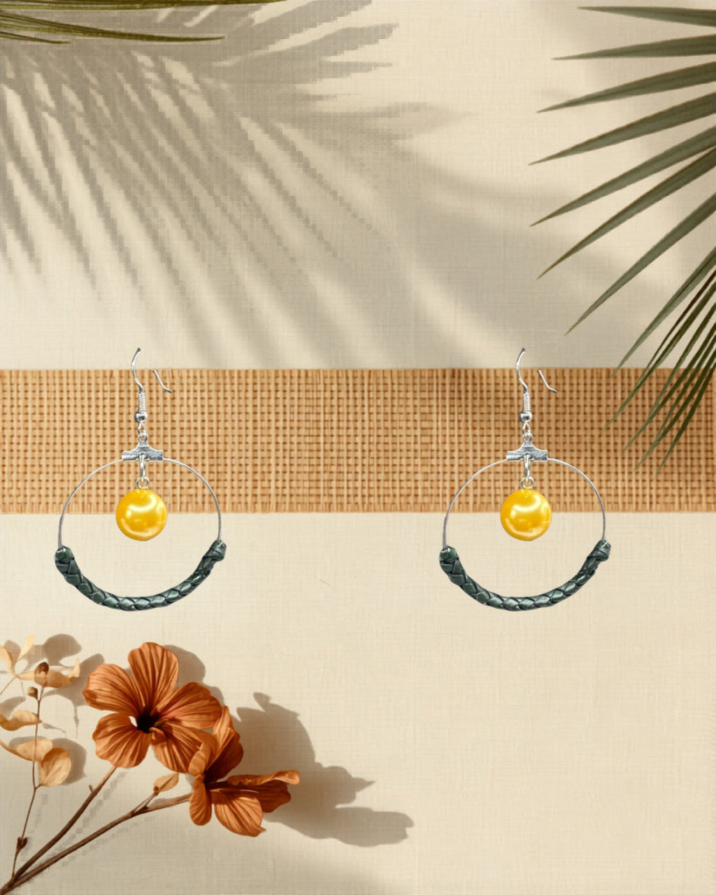 Lauhala half wrap silver hoop earrings styled on tropical Hawaiian background