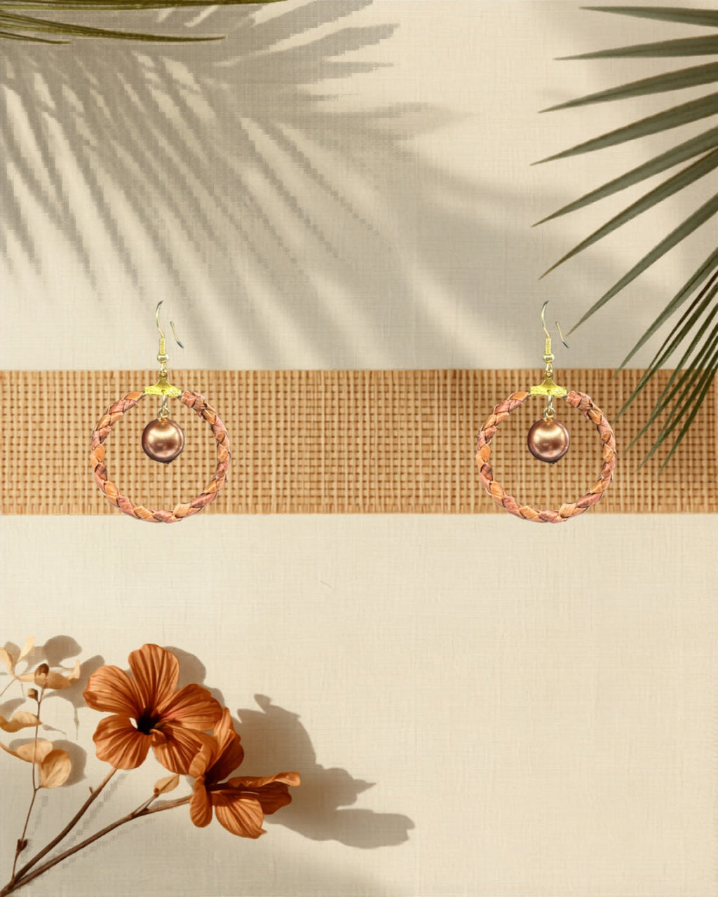 Lauhala full wrap hoop earrings with brown shell pearls styled on tropical Hawaiian background
