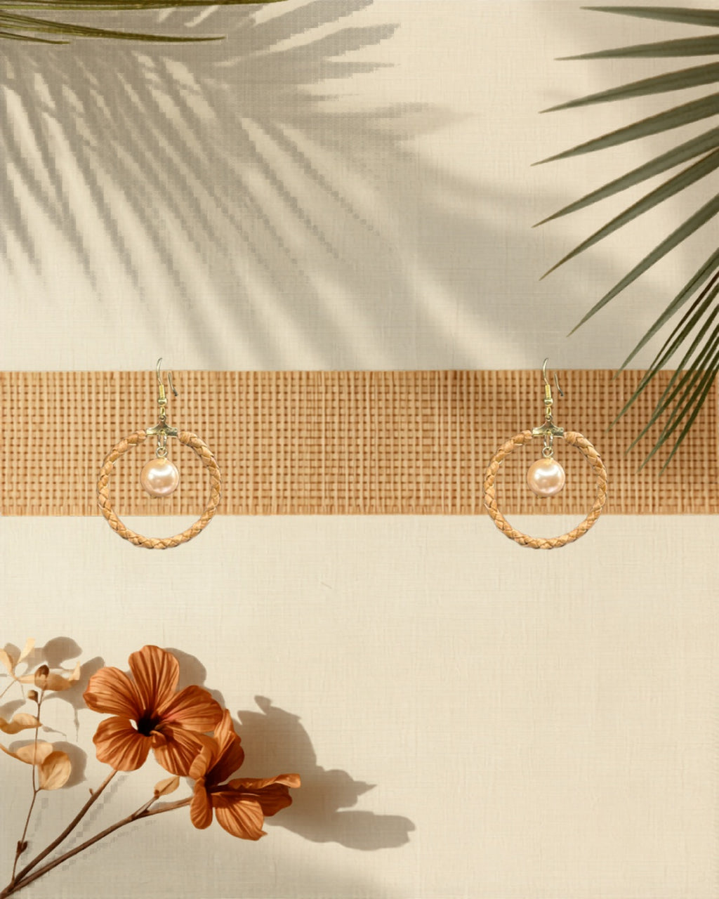 Lauhala full wrap hoop earrings with beige shell pearls styled on tropical Hawaiian background